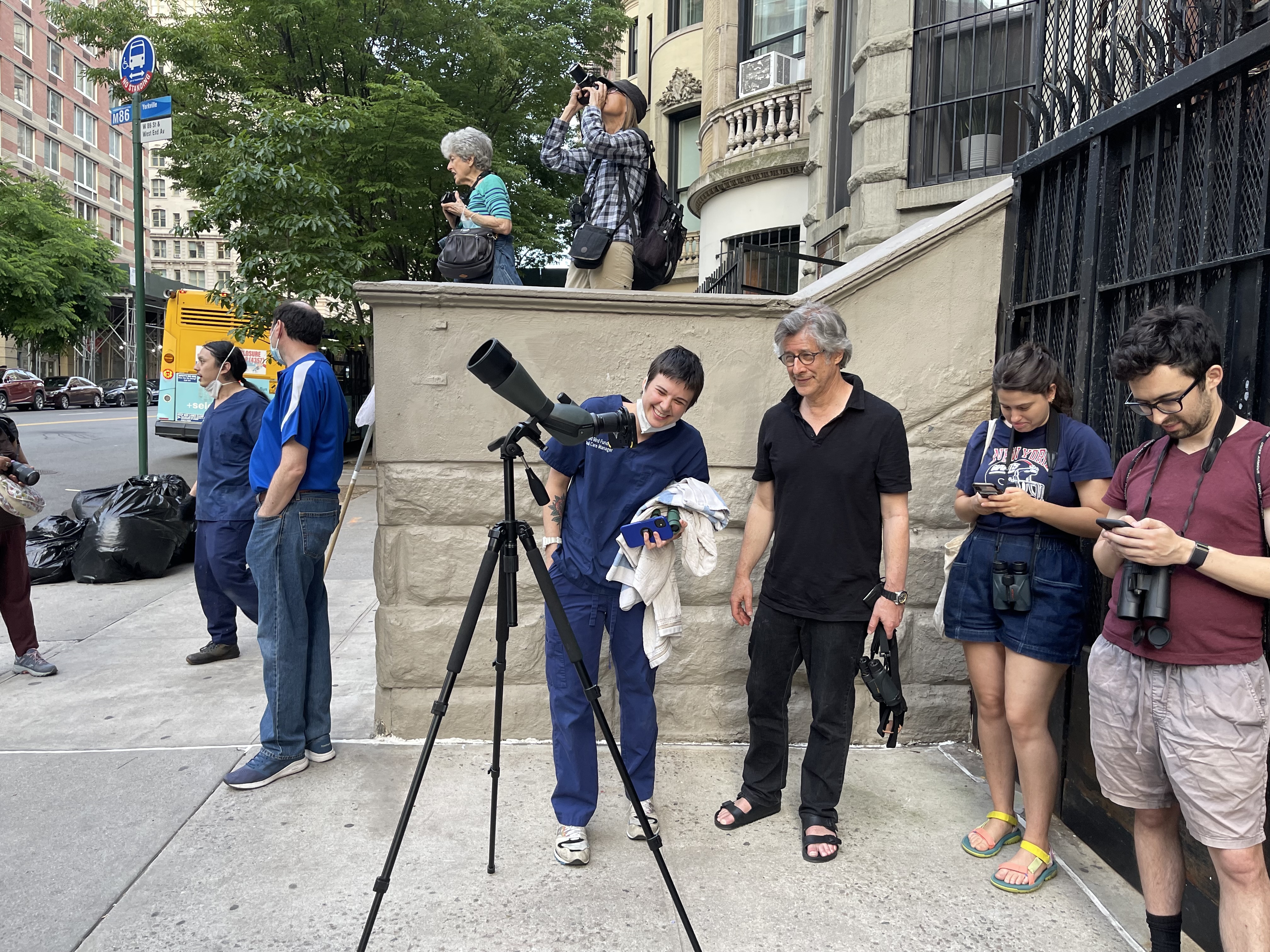 Jonathan Zucker and other admirers gather to watch the young peregrines. Photo: Karen Benfield