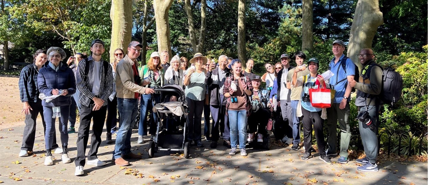 Jane Spielman (far left) poses at the entrance to Fort Tryon Park during an accessible birding tour for World Migratory Bird Day, 2024. Photo: George S.C. Wang