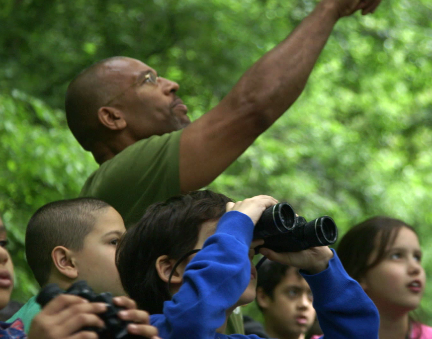 Board Member Chris Cooper leads a Feathered Friends school outing in Van Cortlandt Park. Photo: NYC Bird Alliance