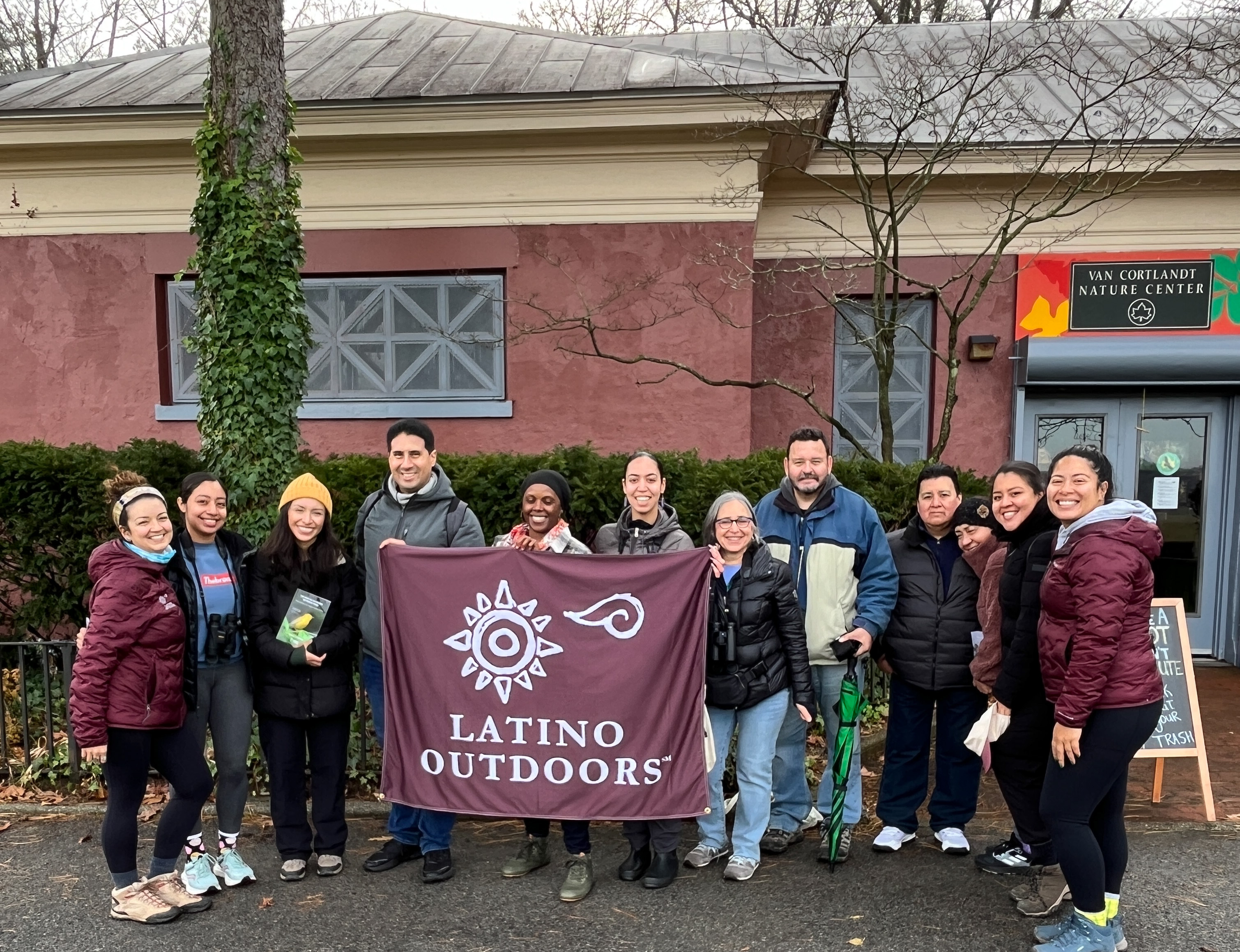 Bilingual Birding participants posing in front of the Van Cortlandt Nature Center. Photo: Sofia Sainz