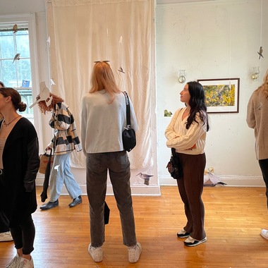 Governors Island visitors engage with 2023 AiR Carolyn Monastra's Divergence of Birds installation.