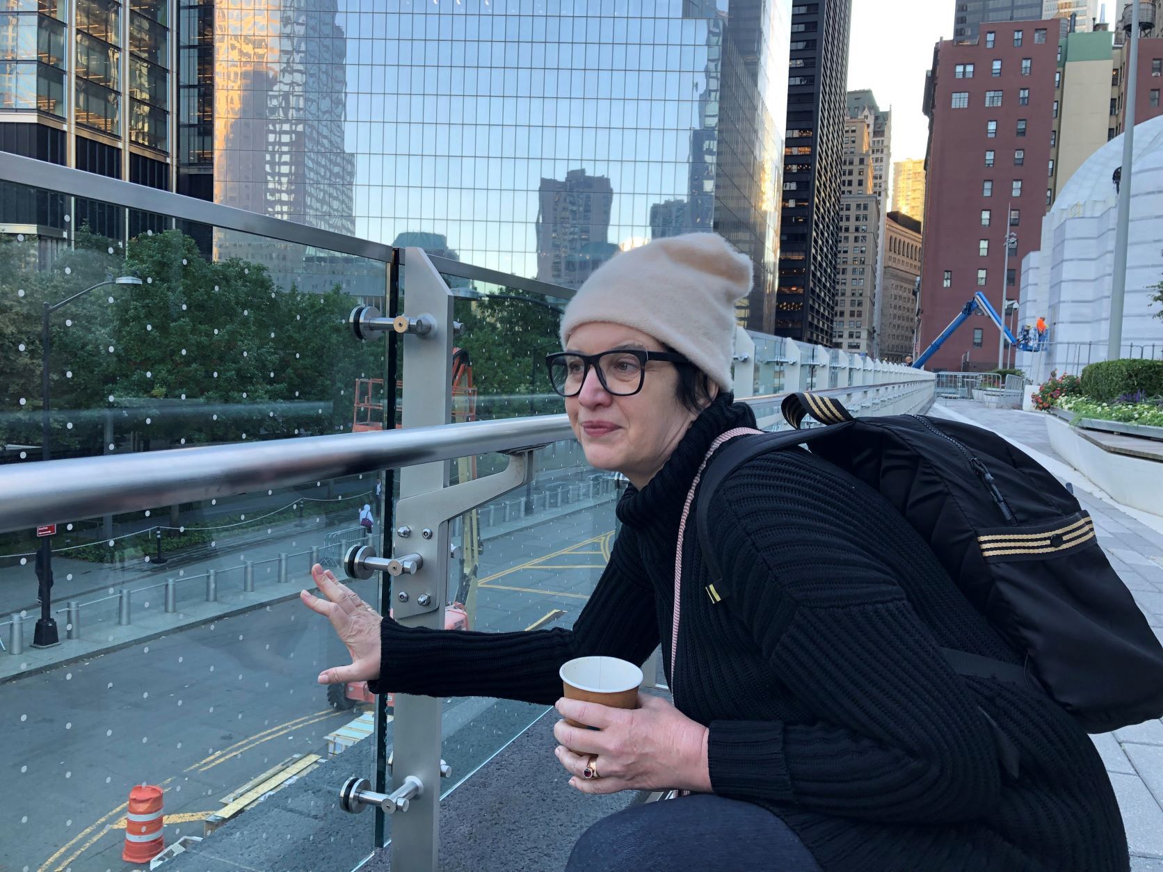 Project Safe Flight volunteer Melissa Breyer surveys Liberty Park’s now bird-safe railing. Photo: Tod Winston